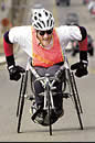 shot of wheelchair racing athlete training for a marathon event